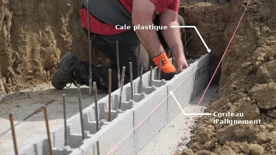 Mise en place des blocs entre les têtes d’assise