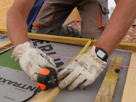 Pose des liteaux et des planches de rive