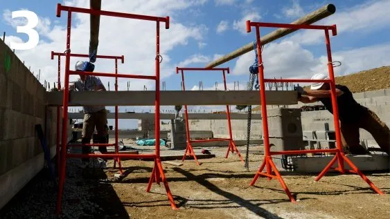 Mise en place de la longrine sur ses appuis