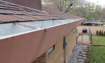 Exemple de gouttière rampante