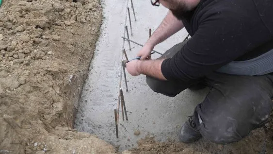 Dépose des barres de fer