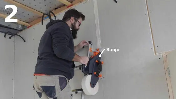 Pose de bande à joint 