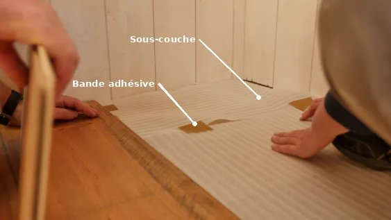 Mise en place de la sous-couche résiliente pour parquet