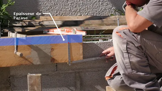 Le niveau de la tête de coffrage