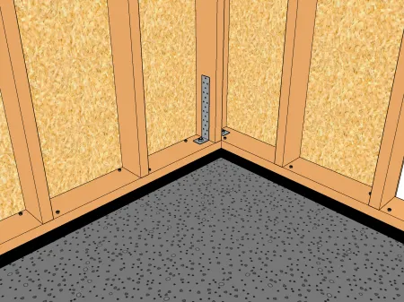 Montage des pans de murs sur des lisses basses