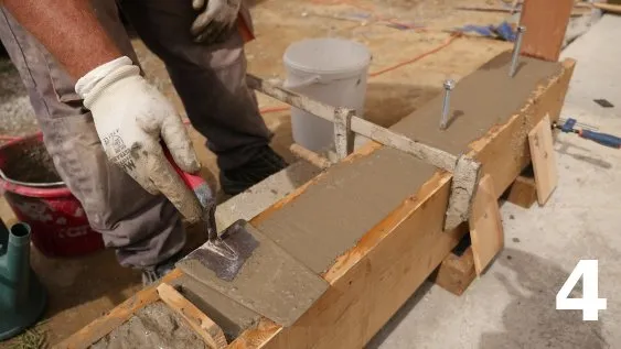 Mise à niveau du béton avec un truelle