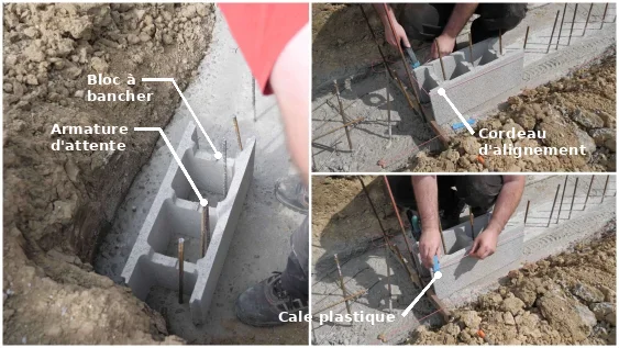 Pose des blocs de têtes de la première assise du mur